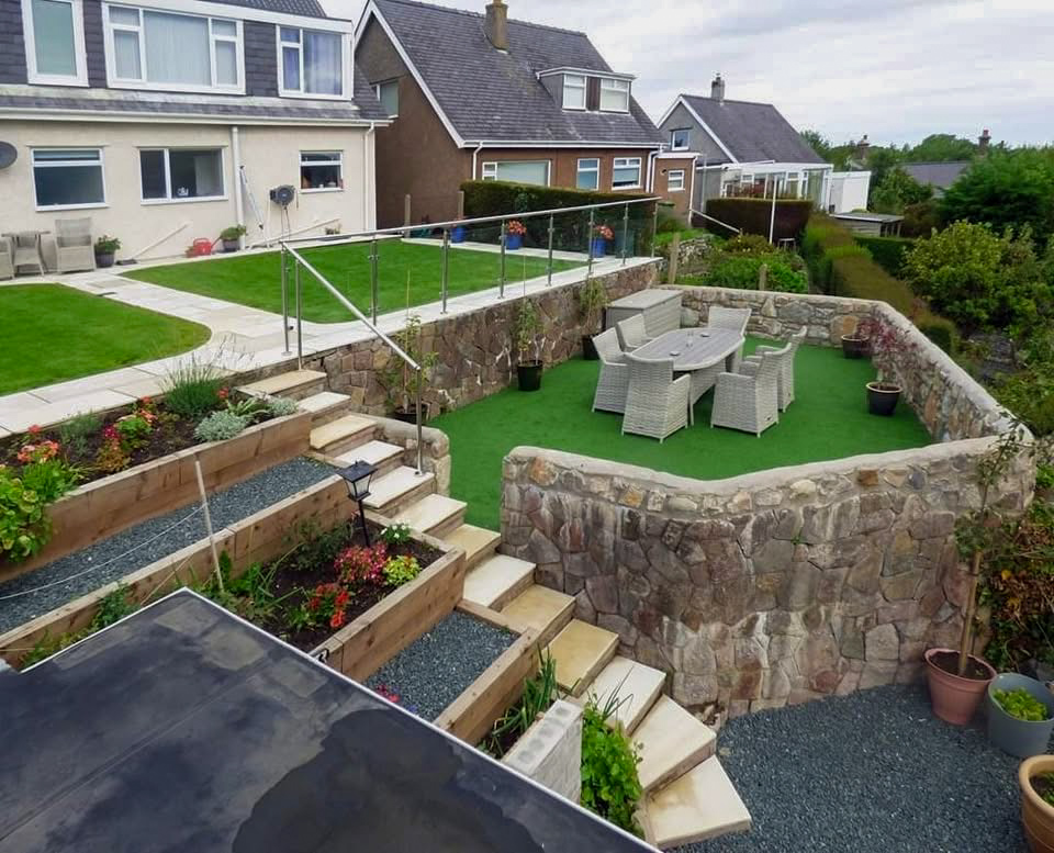 Split-Level Back Garden in Moelfre — artificial grass by N.S.W. Patio Specialist